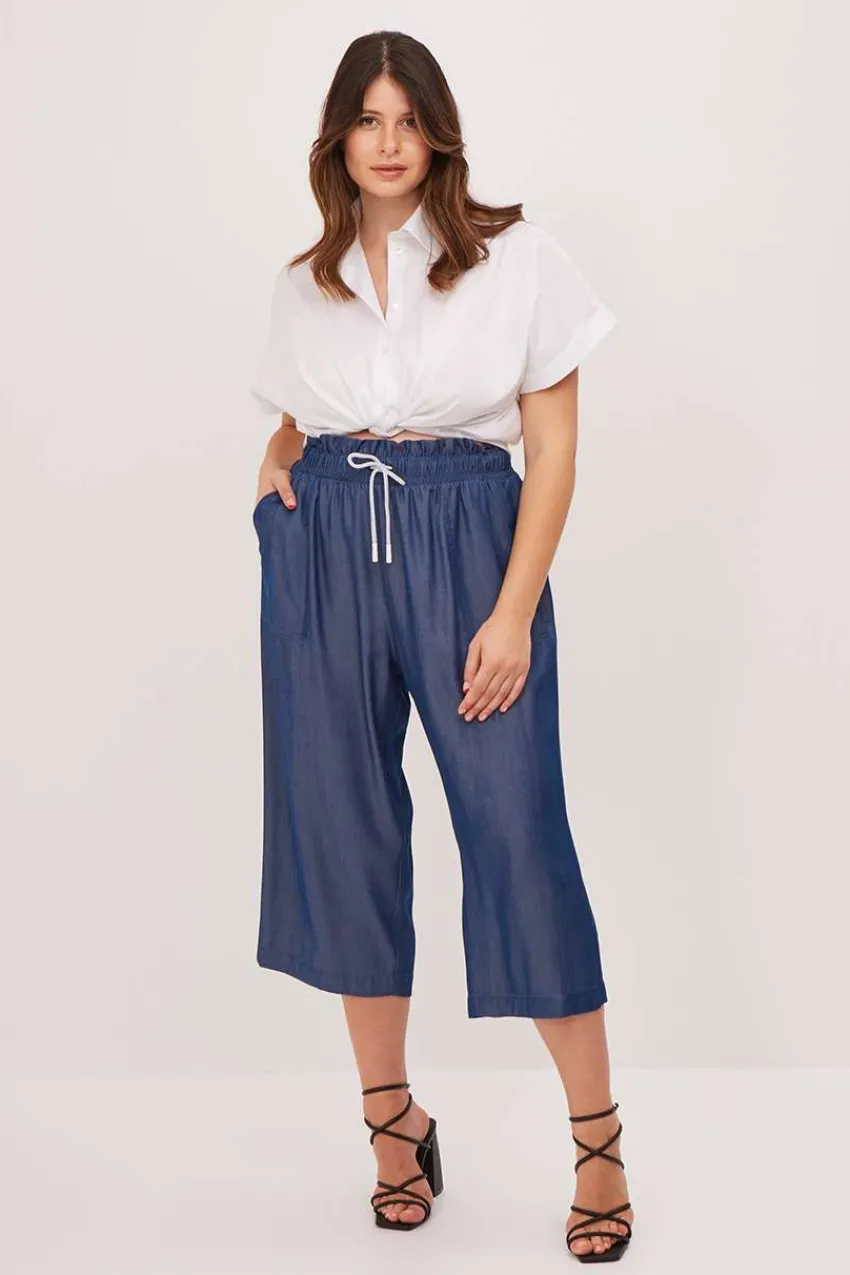 pantalone_effetto_denim_l_0.webp Mat Fashion Pantalone effetto denim lucido taglie comode Fashion