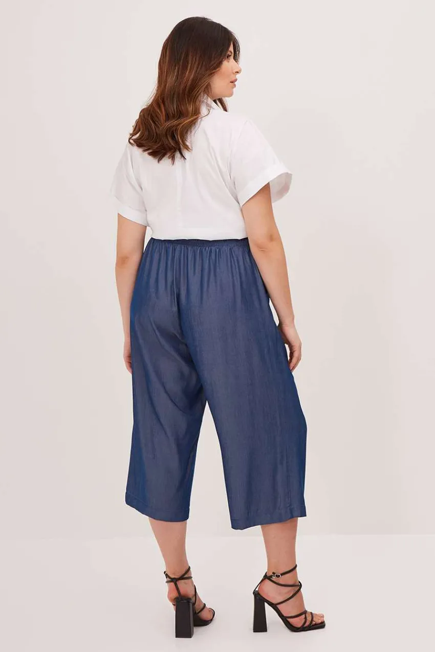 pantalone_effetto_denim_l_3.webp Mat Fashion Pantalone effetto denim lucido taglie comode Fashion