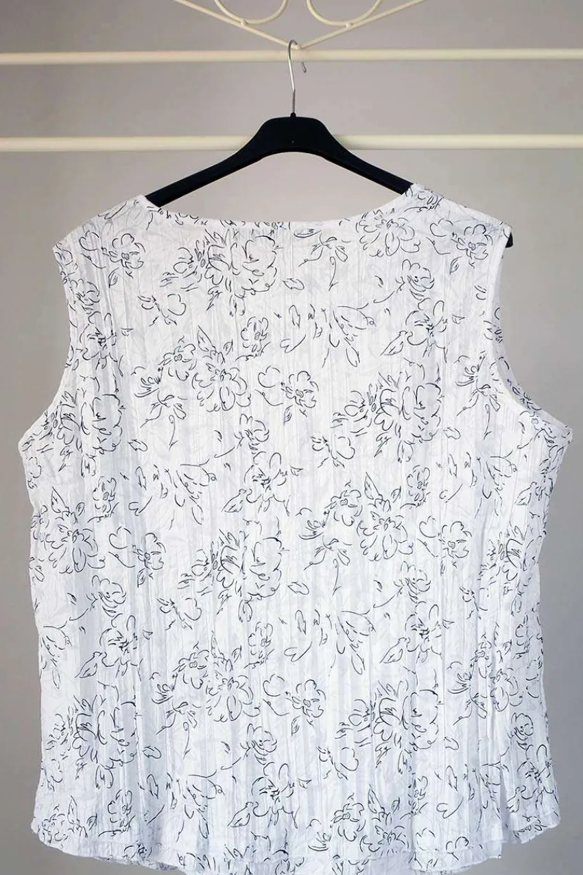 top_stropicciato_taglie_f_2.webp Navigazione Top Stropicciato taglie forti Outlet